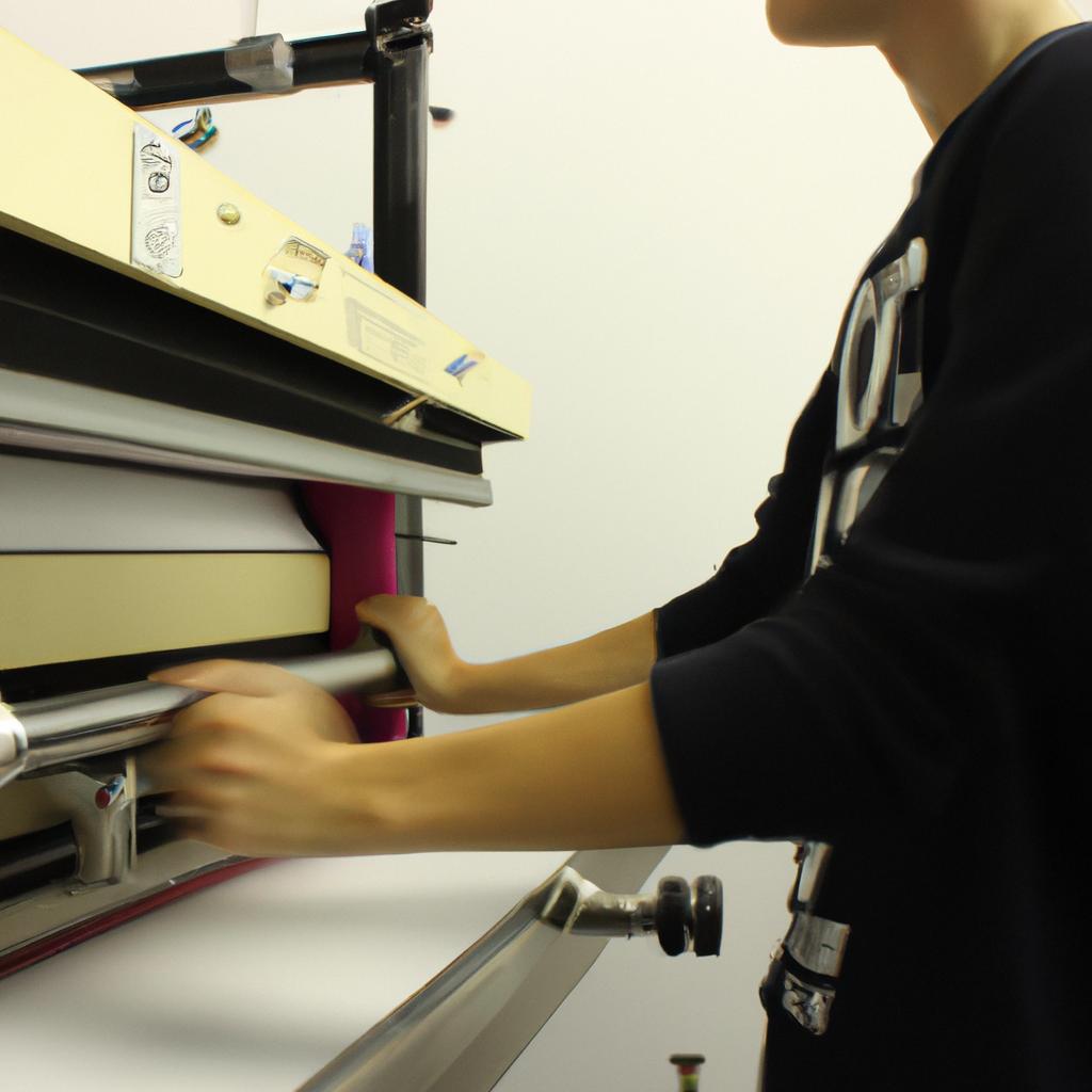 Person operating screen printing machine